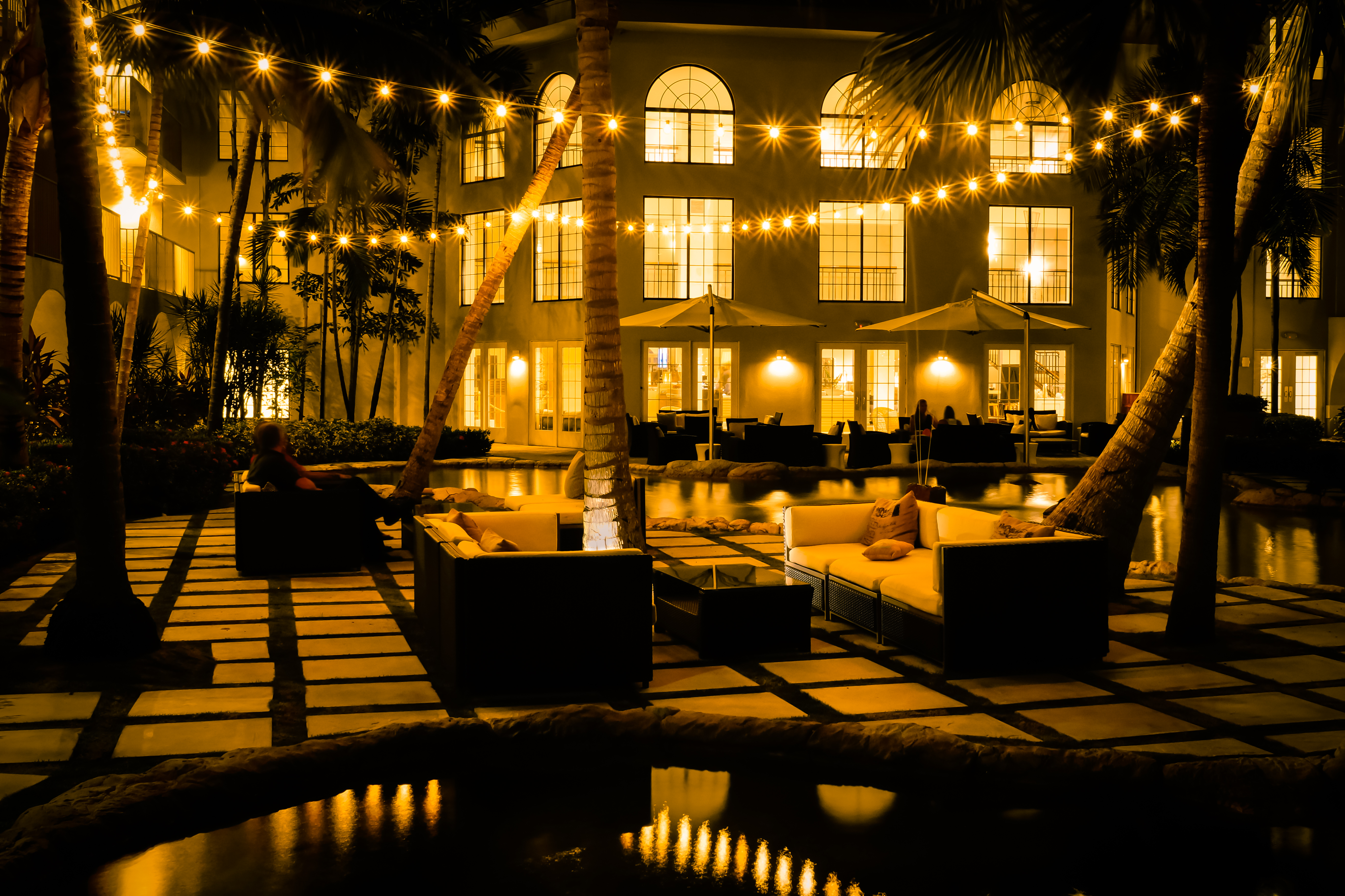 courtyard night scene beach resort marriott