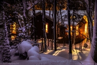 glowing muskoka cottage in a winter wonderland