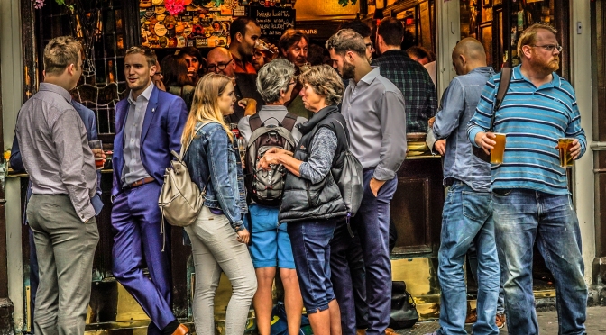 Socializing – aka drinking – at a London England sidewalk cafe and pub